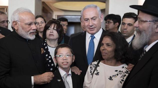 Prime Minister Narendra Modi and Israeli Prime Minister Benjamin Netanyahu meet with Moshe Holtzberg (C), son of slain US Rabbi Gavriel Holtzberg who was killed with his wife in the November 26, 2008 attacks on the Nariman Chabad house in Mumbai, on July 5, 2017. The young Moshe was rescued in 2008 by his nanny following the attacks. (AFP File Photo) Prime Minister Narendra Modi and Israeli Prime Minister Benjamin Netanyahu meet with Moshe Holtzberg (C), son of slain US Rabbi Gavriel Holtzberg who was killed with his wife in the November 26, 2008 attacks on the Nariman Chabad house in Mumbai, on July 5, 2017. The young Moshe was rescued in 2008 by his nanny following the attacks. (AFP File Photo)