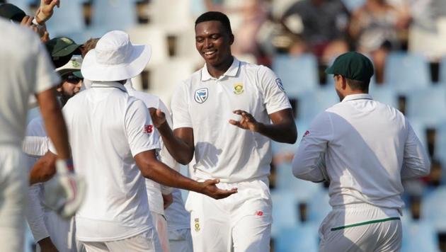 South African bowler Lungi Ngidi (C) and his teammates celebrate the dismissal of Indian batsman Parthiv Patel (not in picture) during the second day of the second Test at SuperSport Park in Centurion.(AFP)