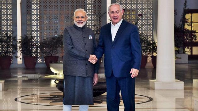 Prime Minister Narendra Modi receives his Israeli counterpart Benjamin Netanyahu ,in New Delhi on Sunday.(PTI)