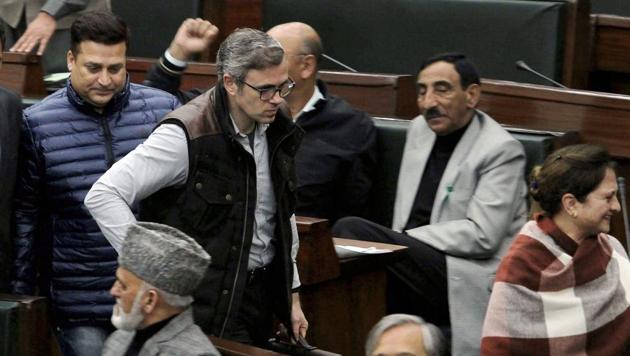Jammu & Kashmir National Conference Working President Omar Abdullah with party MLAs inside the legislative assembly during the ongoing budget session, in Jammu on Monday.(PTI)