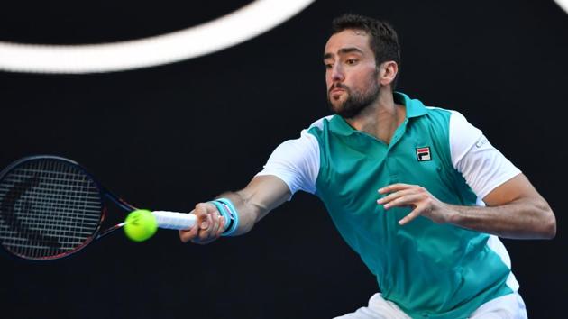 Marin Cilic returns to Vasek Pospisil during their men's singles first round match on day one of the Australian Open tennis tournament in Melbourne on January 15, 2018. Cilic won 6-2, 6-2, 4-6, 7-6 (7/5). (AFP) Marin Cilic returns to Vasek Pospisil during their men's singles first round match on day one of the Australian Open tennis tournament in Melbourne on January 15, 2018. Cilic won 6-2, 6-2, 4-6, 7-6 (7/5). (AFP)