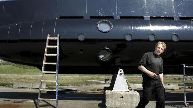 This April 2008 photo shows Peter Madsen with his submarine. Police in Denmark said he has admitted dismembering a Swedish journalist who disappeared from his submarine. (AP File Photo) This April 2008 photo shows Peter Madsen with his submarine. Police in Denmark said he has admitted dismembering a Swedish journalist who disappeared from his submarine. (AP File Photo)