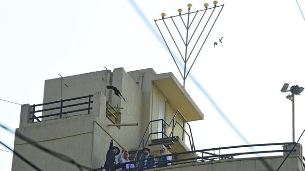Israeli officials and Nariman House members inspect the area before Netanyahu’s visit. (Vijayanand Gupta/HT) 