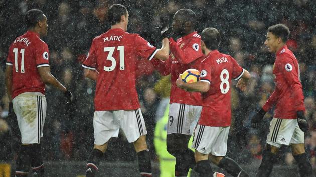 Manchester United's Romelu Lukaku (C) celebrates scoring their third goal against Stoke City in their Premier League encounter. (AFP) Manchester United's Romelu Lukaku (C) celebrates scoring their third goal against Stoke City in their Premier League encounter. (AFP)