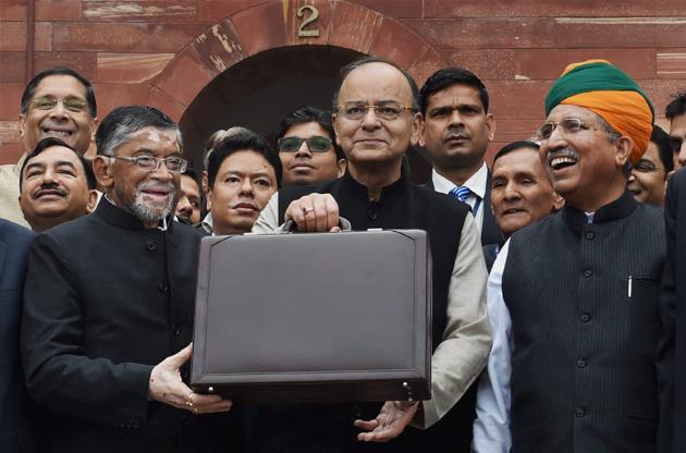 Finance minister Arun Jaitley stands outside his office at North Block holding the briefcase containing the Union budget 2017 on February 1, 2017, in New Delhi.(PTI File Photo)