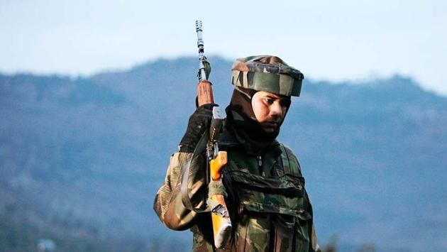 File photo of an Indian Army soldier as he patrols near the Line of Control. (AP File Photo) File photo of an Indian Army soldier as he patrols near the Line of Control. (AP File Photo)