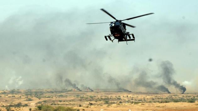 A Army helicopter takes part in a fire drill exercise at KK ranges, Ahmednagar  (HT PHOTO) 