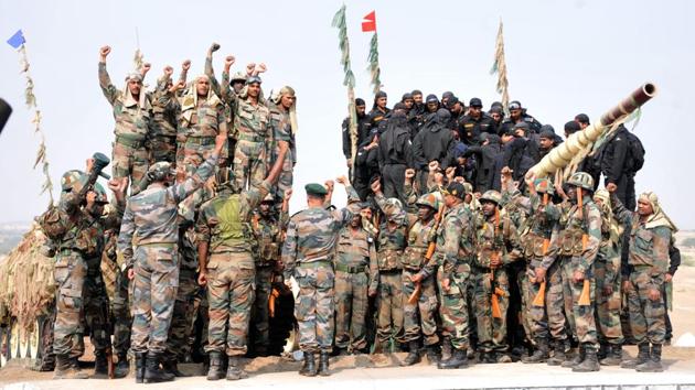 Soldiers celebrate by chanting  ‘Bharat Mata Ki Jai’ (slogan ) after finishing the Army fire drill exercise at KK ranges, Ahmednagar. (HT PHOTO) 