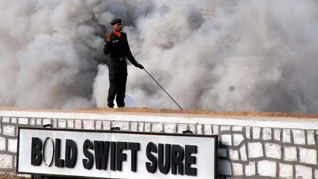 A soldier in action during the Army fire drill at KK ranges, Ahmednagar. (HT PHOTO) 