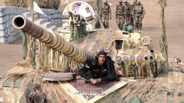 A tank crew  man seen in action during the Army fire drill at KK ranges, Ahmednagar. (HT PHOTO) 