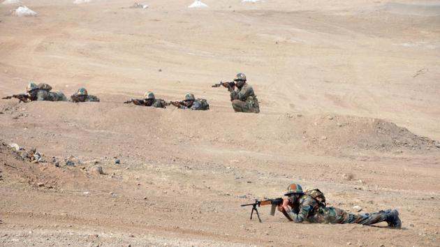 Soldiers in action during a Army fire drill exercise at KK Range, Ahmednagar in Pune. (HT PHOTO) 