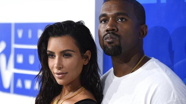 FILE - In this Aug. 28, 2016 file photo, Kim Kardashian West, left, and Kanye West arrive at the MTV Video Music Awards in New York. (AP) FILE - In this Aug. 28, 2016 file photo, Kim Kardashian West, left, and Kanye West arrive at the MTV Video Music Awards in New York. (AP)