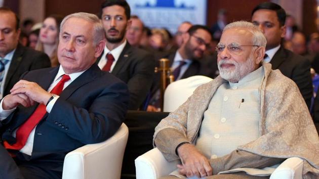 Prime Minister Narendra Modi with his Israeli counterpart Benjamin Netanyahu at the Raisina Dialogue in New Delhi on Tuesday.(PTI Photo)