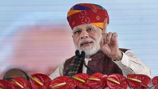 Prime Minister Narendra Modi addresses a public rally in Barmer on Tuesday. (PTI) Prime Minister Narendra Modi addresses a public rally in Barmer on Tuesday. (PTI)