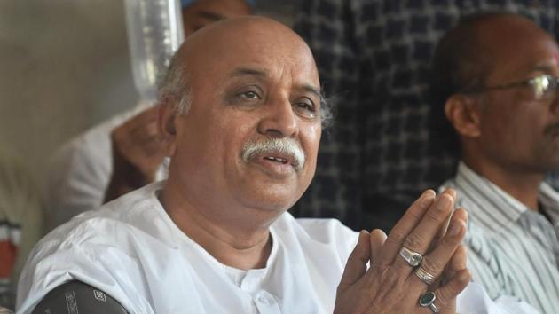 VHP leader Pravin Togadia during a press conference at Chandramani Hospital in Ahmedabad on Tuesday. A tearful Togadia, 62, charged that “some people” were trying to stifle his voice and that he was not allowed to speak on issues like Ram Temple, farmers and cow slaughter. He also said that he went into hiding fearing a police encounter. (Santosh Hirlekar / PTI) VHP leader Pravin Togadia during a press conference at Chandramani Hospital in Ahmedabad on Tuesday. A tearful Togadia, 62, charged that “some people” were trying to stifle his voice and that he was not allowed to speak on issues like Ram Temple, farmers and cow slaughter. He also said that he went into hiding fearing a police encounter. (Santosh Hirlekar / PTI)