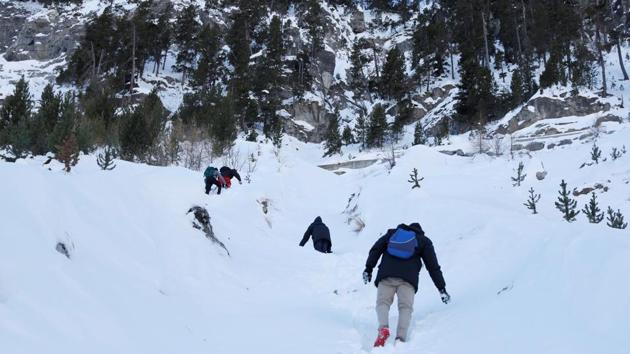 The terrain is steep and the group of five faced risks ranging from losing their footing on steep drops, being struck by falling rocks or succumbing to the -9C temperatures in ill-suited clothing. In a bid to evade increased border security at easier crossing points this group crossed into France in December. (Siegfried Modola / Reuters) The terrain is steep and the group of five faced risks ranging from losing their footing on steep drops, being struck by falling rocks or succumbing to the -9C temperatures in ill-suited clothing. In a bid to evade increased border security at easier crossing points this group crossed into France in December. (Siegfried Modola / Reuters)
