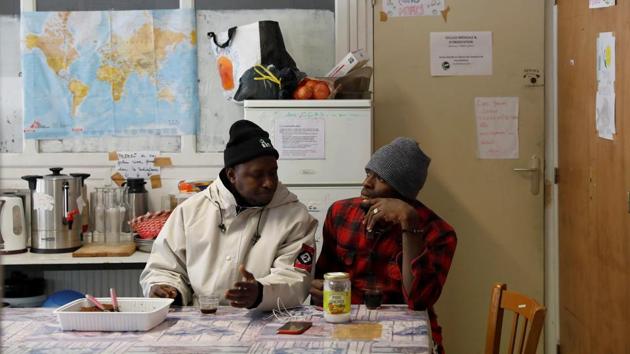 Abdullhai (L) and Abu (R) discuss their day having crossed part of the Alps mountain range from Italy into France, in the shelter centre of an organisation for migrants in the town of Briancon in southeastern France. (Siegfried Modola / Reuters) Abdullhai (L) and Abu (R) discuss their day having crossed part of the Alps mountain range from Italy into France, in the shelter centre of an organisation for migrants in the town of Briancon in southeastern France. (Siegfried Modola / Reuters)