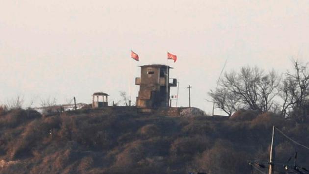 A North Korean flag flutters on the top of their guard post inside North Korean territory. (Reuters File Photo) A North Korean flag flutters on the top of their guard post inside North Korean territory. (Reuters File Photo)