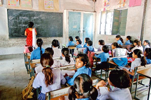 A teacher at a classroom in a government school in Delhi. (Hindustan Times Media) A teacher at a classroom in a government school in Delhi. (Hindustan Times Media)