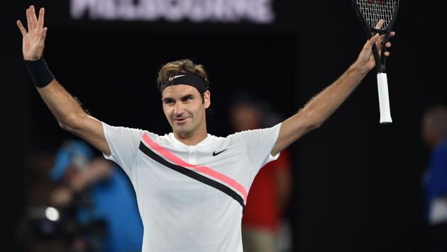 Switzerland's Roger Federer reacts after beating Slovenia's Aljaz Bedene in their men's singles first round match on Day 2 of the Australian Open tennis tournament in Melbourne on Tuesday. (AFP)