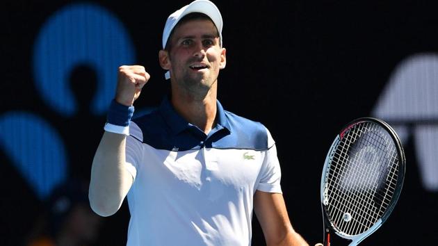 Serbia's Novak Djokovic reacts after a point against Donald Young during their Australian Open encounter. (AFP) Serbia's Novak Djokovic reacts after a point against Donald Young during their Australian Open encounter. (AFP)