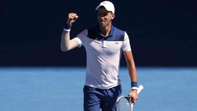 Novak Djokovic of Serbia reacts after winning his match against Donald Young of the US at the Margaret Court Arena. (REUTERS)