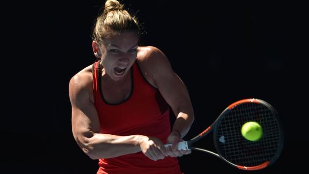 Halep overcame a major ankle injury scare to win her women’s singles first round at Melbourne Park. (AFP)