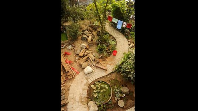 A garden with a brick-lined walkway reminiscent of Japanese traditional homes, forms part of the house in Santiniketan. A six-member Japanese team is combining traditional elements to create the feel of a contemporary Japanese home. (Samir Jana / HT Photo) A garden with a brick-lined walkway reminiscent of Japanese traditional homes, forms part of the house in Santiniketan. A six-member Japanese team is combining traditional elements to create the feel of a contemporary Japanese home. (Samir Jana / HT Photo)