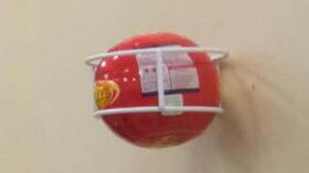 The fireballs contain a dry powder that releases a special chemical to douse the fire faster than usual. (HT) The fireballs contain a dry powder that releases a special chemical to douse the fire faster than usual. (HT)