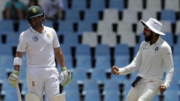 Indian cricket team skipper Virat Kohli (right) celebrates the dismissal of South Africa cricket team's Dean Elgar, who scored 61 runs on the fourth day of the second Test in Centurion on Tuesday. Had it not been for Elgar’s 141-run partnership with AB de Villiers, South Africa would surely been in trouble.(AP)