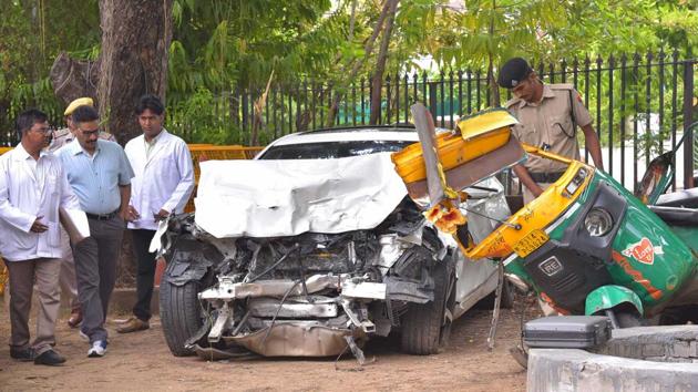 FSL officials investigate the mangled remains of the auto which the BMW hit. (HT File Photo) FSL officials investigate the mangled remains of the auto which the BMW hit. (HT File Photo)