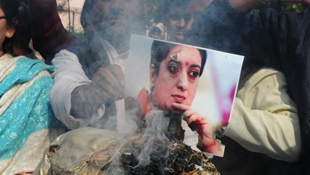 Congress workers and supporters burn an effigy of then union HRD minister Smriti Irani in Bhopal. Irani’s statement that Vemula’s death was not a “Dalit versus non-Dalit issue” and that there was a “malicious attempt to project it as a caste battle” sparked further outrage. (Mujeeb Faruqui / HT Photo) Congress workers and supporters burn an effigy of then union HRD minister Smriti Irani in Bhopal. Irani’s statement that Vemula’s death was not a “Dalit versus non-Dalit issue” and that there was a “malicious attempt to project it as a caste battle” sparked further outrage. (Mujeeb Faruqui / HT Photo)