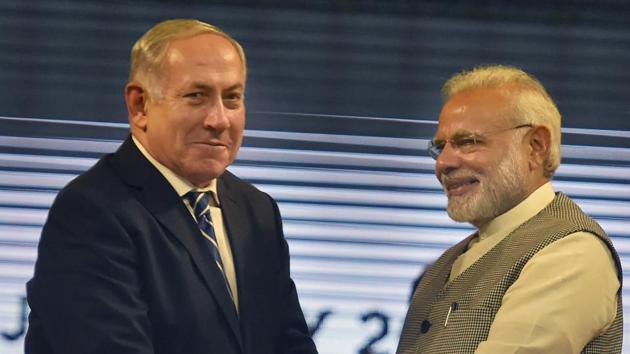 Prime Minister Narendra Modi, his Israeli counterpart Benjamin Netanyahu and wife Sara Netanyahu during the inauguration of the International Center For Entrepreneurship & Technology – iCreate at Deo Dholera village in Ahmedabad on Wednesday. (PTI Photo) Prime Minister Narendra Modi, his Israeli counterpart Benjamin Netanyahu and wife Sara Netanyahu during the inauguration of the International Center For Entrepreneurship & Technology – iCreate at Deo Dholera village in Ahmedabad on Wednesday. (PTI Photo)