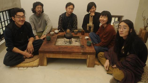 (L-R) Kazuhiro Aoshima (carpenter), Miku Watanabe (fashion designer), Nobuhiko Kawahara (doll maker), Shigeru Sebe (painter) and Sayuri Hashimoto (mending designer), other members of Sato’s team gather in the tokonoma, a reception room. As in any traditional Japanese house, the team members assemble here for meals. (Samir Jana / HT Photo) (L-R) Kazuhiro Aoshima (carpenter), Miku Watanabe (fashion designer), Nobuhiko Kawahara (doll maker), Shigeru Sebe (painter) and Sayuri Hashimoto (mending designer), other members of Sato’s team gather in the tokonoma, a reception room. As in any traditional Japanese house, the team members assemble here for meals. (Samir Jana / HT Photo)