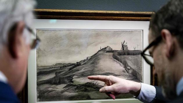 Dutch businessman John Fentener van Vlissingen (L) and director of the Van Gogh Museum in Amsterdam Axel Ruger (R) look at a recently discovered drawing dated from 1886 by Vincent Van Gogh. (AFP) Dutch businessman John Fentener van Vlissingen (L) and director of the Van Gogh Museum in Amsterdam Axel Ruger (R) look at a recently discovered drawing dated from 1886 by Vincent Van Gogh. (AFP)