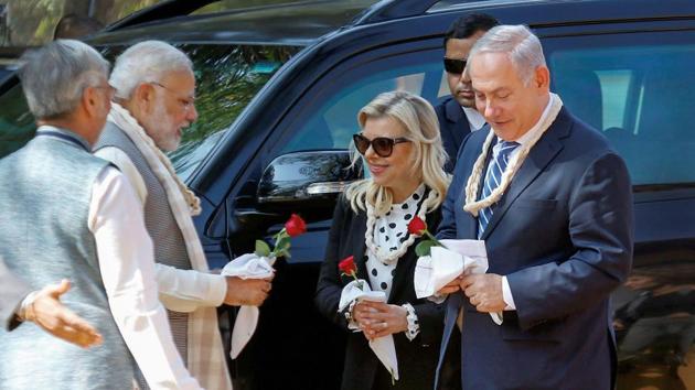 Prime Minister Modi, Israeli Prime Minister Benjamin Netanyahu and his wife Sara Netanyahu arrive at Sabarmati Ashram. The Israeli PM is on a six-day visit to India and scheduled for Mumbai later. (PTI)