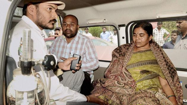 Vemula's mother Radhika Vemula is given first aid in an ambulance after she was injured while being arrested by the police at Hyderabad Central University. (PTI) Vemula's mother Radhika Vemula is given first aid in an ambulance after she was injured while being arrested by the police at Hyderabad Central University. (PTI)