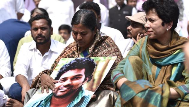 Members of the Youth Congress along with Vemula's mother Radhika (centre) during a protest in New Delhi. “His family story haunted Rohith all his life,” said Riyaz. “He faced caste discrimination in the house where he grew up. But instead of succumbing, Rohith fought it out. He broke many barriers before he got to the final stretch, his PhD.” (Arun Sharma / HT Photo) Members of the Youth Congress along with Vemula's mother Radhika (centre) during a protest in New Delhi. “His family story haunted Rohith all his life,” said Riyaz. “He faced caste discrimination in the house where he grew up. But instead of succumbing, Rohith fought it out. He broke many barriers before he got to the final stretch, his PhD.” (Arun Sharma / HT Photo)