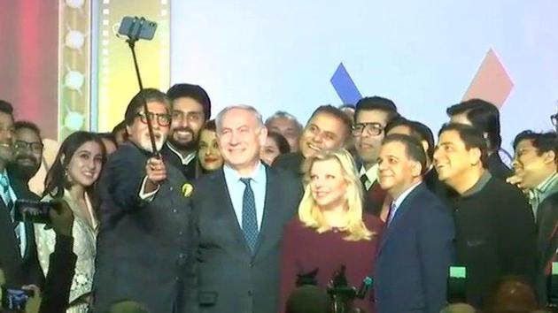 Bollywood actors and directors take a selfie with Israeli Prime Minister Benjamin Netanyahu and his wife Sara in Mumbai on Thursday.(ANI Photo.Twitter)