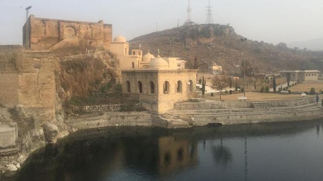 The sacred pond at the Katas Raj temple complex has been temporarily filled with water from a nearby source.(HT Photo) The sacred pond at the Katas Raj temple complex has been temporarily filled with water from a nearby source.(HT Photo)