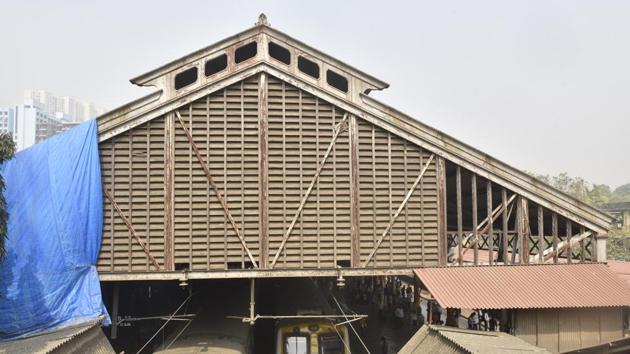The aesthetic of the sloping decorative wooden roof at both exits is at present obstructed by more recent construction. Byculla station holds an important place in the history of Indian railways as one of the stations along India’s first railway route. According to BMC records, the station itself is a listed heritage structure. (Anshuman Poyrekar / HT Photo) The aesthetic of the sloping decorative wooden roof at both exits is at present obstructed by more recent construction. Byculla station holds an important place in the history of Indian railways as one of the stations along India’s first railway route. According to BMC records, the station itself is a listed heritage structure. (Anshuman Poyrekar / HT Photo)