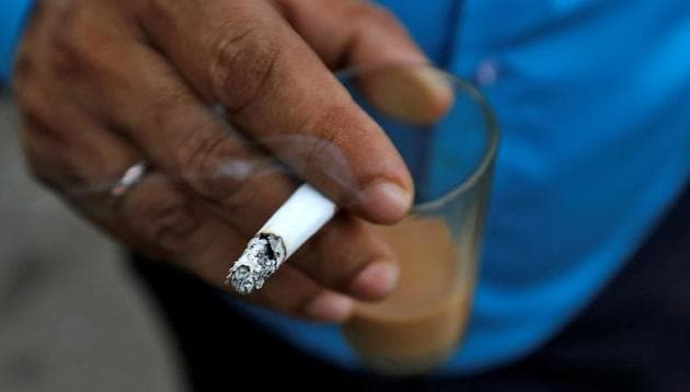 A man smokes a cigarette along a road in Mumbai, India, October 26, 2016. (Reuters File Photo) A man smokes a cigarette along a road in Mumbai, India, October 26, 2016. (Reuters File Photo)