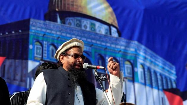 The NIA on Wednesday filed a 1,279 page chargesheet against 12 people, including Lashkar-e-Taiba chief Hafiz Saeed (pictured) and Hizbul Mujahideen head Syed Salahuddin, in a case related to alleged funding of terror and secessionist activities in the Kashmir Valley. (Faisal Mahmood / REUTERS File) The NIA on Wednesday filed a 1,279 page chargesheet against 12 people, including Lashkar-e-Taiba chief Hafiz Saeed (pictured) and Hizbul Mujahideen head Syed Salahuddin, in a case related to alleged funding of terror and secessionist activities in the Kashmir Valley. (Faisal Mahmood / REUTERS File)