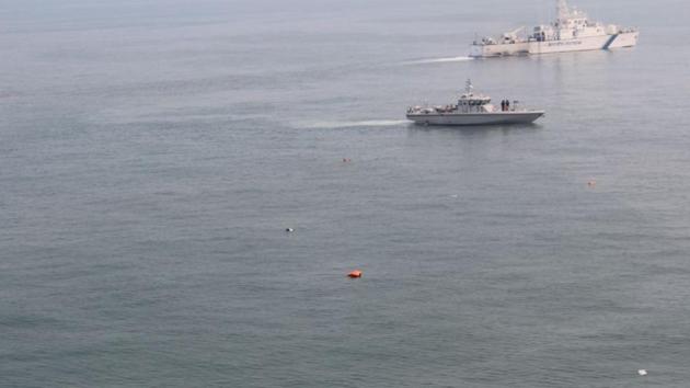 Indian navy units engaged in search and rescue after Pawan Hans helicopter crash off the coast of Mumbai , on January 13.(Hand out by Navy PR) Indian navy units engaged in search and rescue after Pawan Hans helicopter crash off the coast of Mumbai , on January 13.(Hand out by Navy PR)