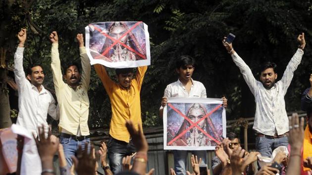 Members of a Karni Sena display posters and shout slogans against the release of Padmaavat near the office of CBFC in Mumbai on Friday, January 12.(AP File Photo)