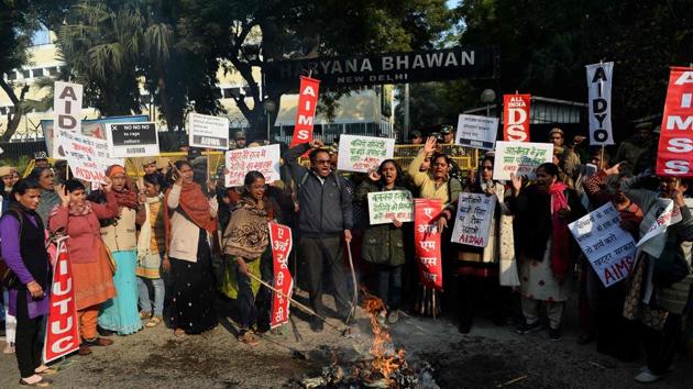 Activists shout slogans during a protest in New Delhi on Wednesday, against a spurt of rape cases reported from Haryana over the past week. (AFP) Activists shout slogans during a protest in New Delhi on Wednesday, against a spurt of rape cases reported from Haryana over the past week. (AFP)