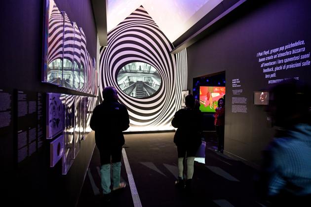 Visitors in the 'Down the rabbit hole' room, during the 'The Pink Floyd Exhibition: Their Mortal Remains' preview. The exhibition marks the first collaboration in decades of Pink Floyd’s remaining members and is promoted by Michael Cohl (Andreas Solaro / AFP) Visitors in the 'Down the rabbit hole' room, during the 'The Pink Floyd Exhibition: Their Mortal Remains' preview. The exhibition marks the first collaboration in decades of Pink Floyd’s remaining members and is promoted by Michael Cohl (Andreas Solaro / AFP)