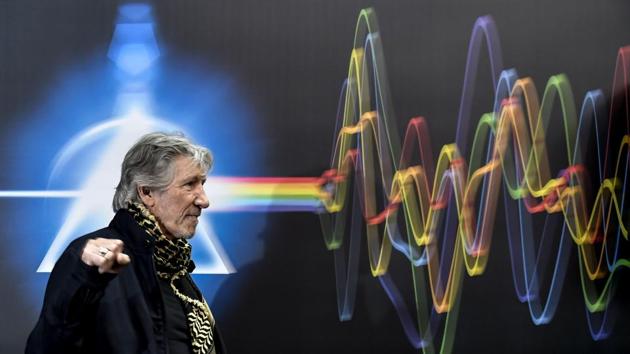 Pink Floyd band member Roger Waters raises a fist as he arrives at a press conference for the ‘The Pink Floyd Exhibition: Their Mortal Remains’ exhibition at the MAXXI Museum in Rome. Waters and fellow band member Nick Mason unveiled the interactive exhibition, charting the iconic band’s legacy, opening to public view on January 19, 2018. (Andreas Soalro / AFP)