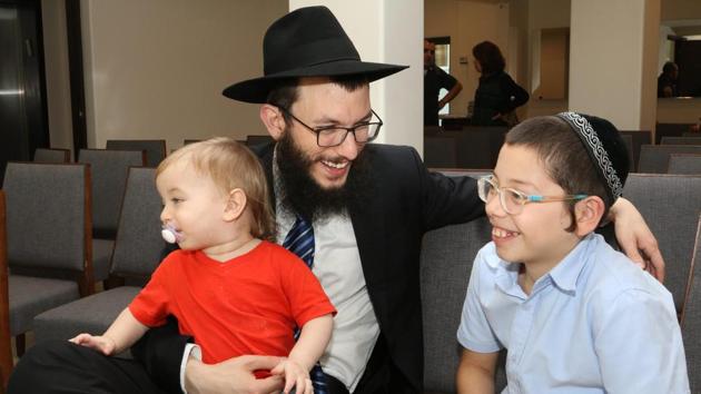 Rabbi Yisroel Kozlovsky with Moshe Holtzberg, at Chabad House in Mumbai on Tuesday. The visit comes six months after the young boy met Prime Minister Narendra Modi on July 5, 2017, and expressed a desire to visit the country. India then issued 10-year multiple entry visas to Moshe and his grandparents. (PTI) Rabbi Yisroel Kozlovsky with Moshe Holtzberg, at Chabad House in Mumbai on Tuesday. The visit comes six months after the young boy met Prime Minister Narendra Modi on July 5, 2017, and expressed a desire to visit the country. India then issued 10-year multiple entry visas to Moshe and his grandparents. (PTI)