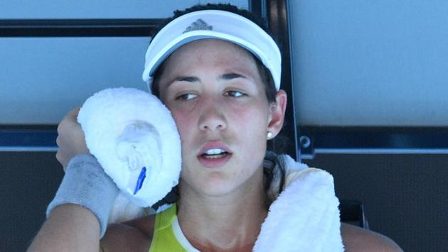 Spain's third seed Garbine Muguruza went down to Chinese Taipei's Hsieh Su-Wei. Many players used ice-towels to combat temperatures in Melbourne which touched an energy-sapping 40 degree Celsius. (AFP)